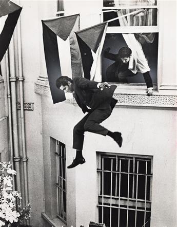 (LEAPERS AND JUMPERS) Contemporary binder containing 32 dramatic photographs of men and women jumping from high-rise buildings, bridges